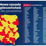 Mapa Polski z oznaczonymi powiatami w strefach żółtej i czerwonej. Obok wykaz 152 powiatów w strefie czerwonej.